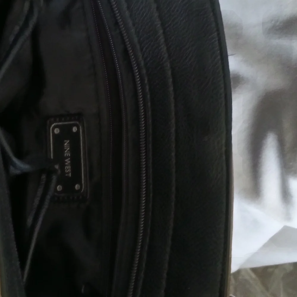 Nine West Purse Black and Cream Satchel Bag Pocket Book Elegant Versatile Tassel